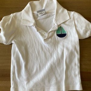 Monogram sailboat polo